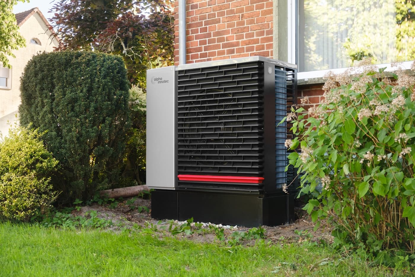 A modern home with an outdoor heat pump