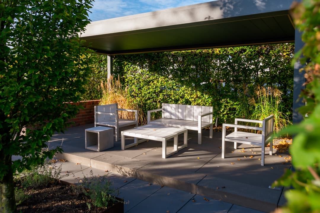 A modern outdoor living patio with lounge seating