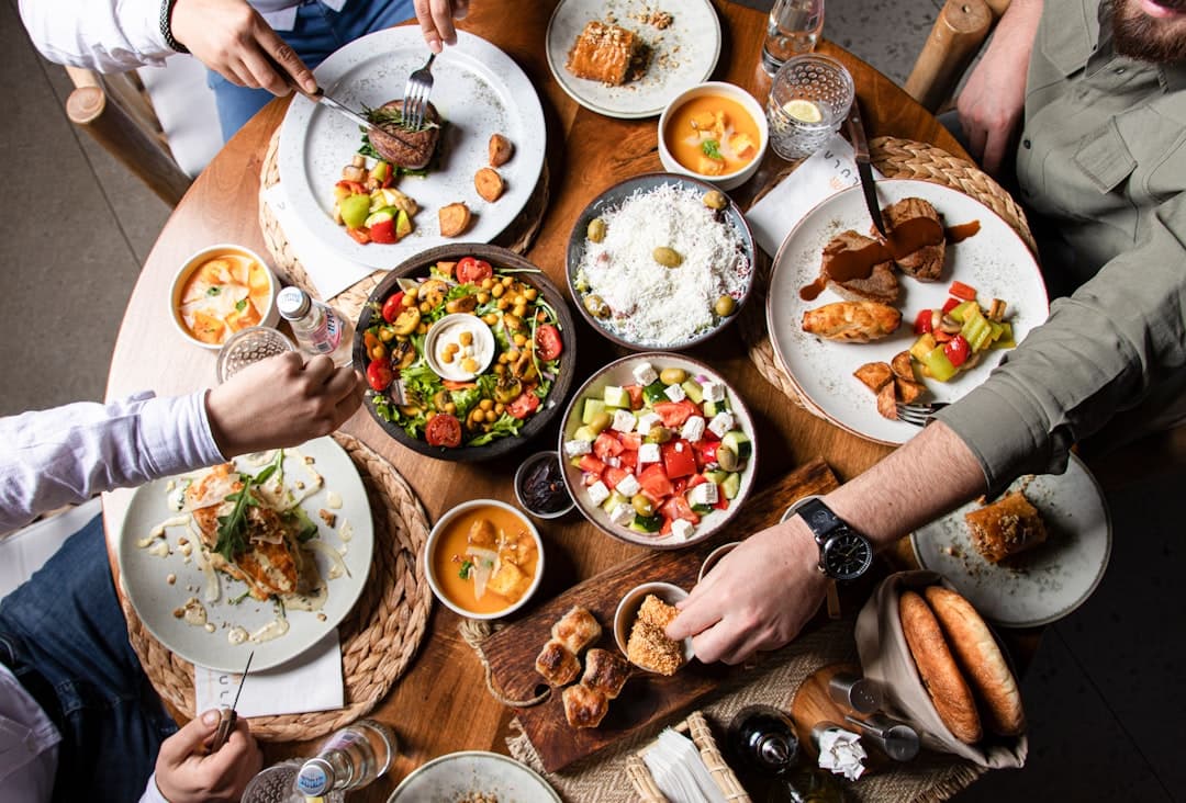 A restaurant table of shared dishes
