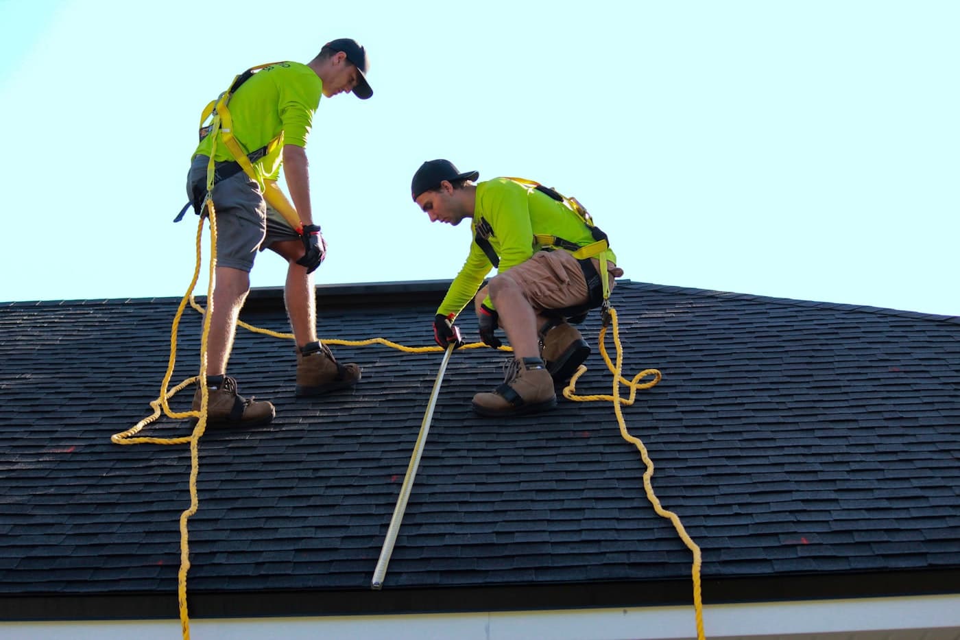 Roofers working on a residential roof